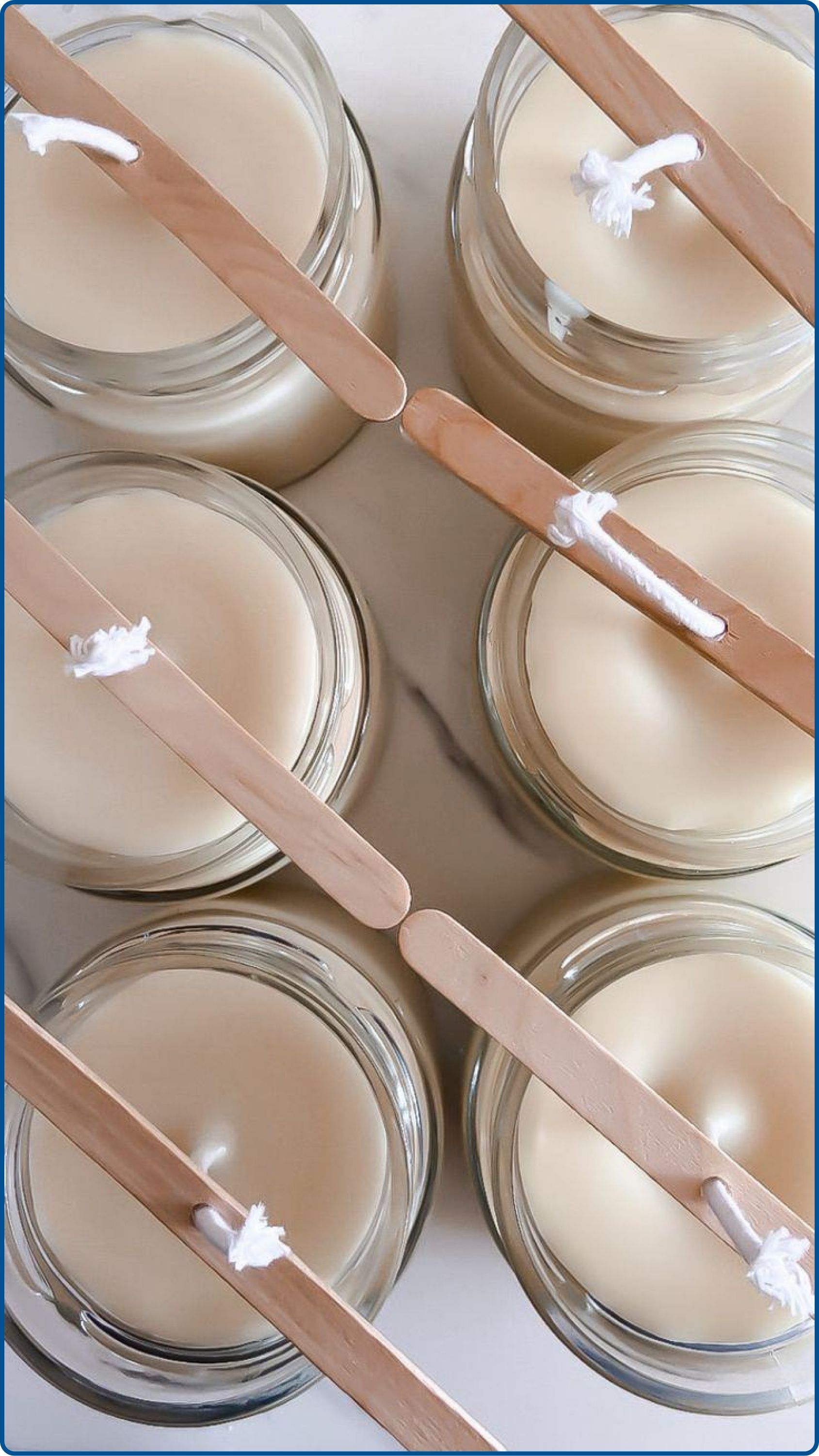 Homemade candle setting with smooth wax surface