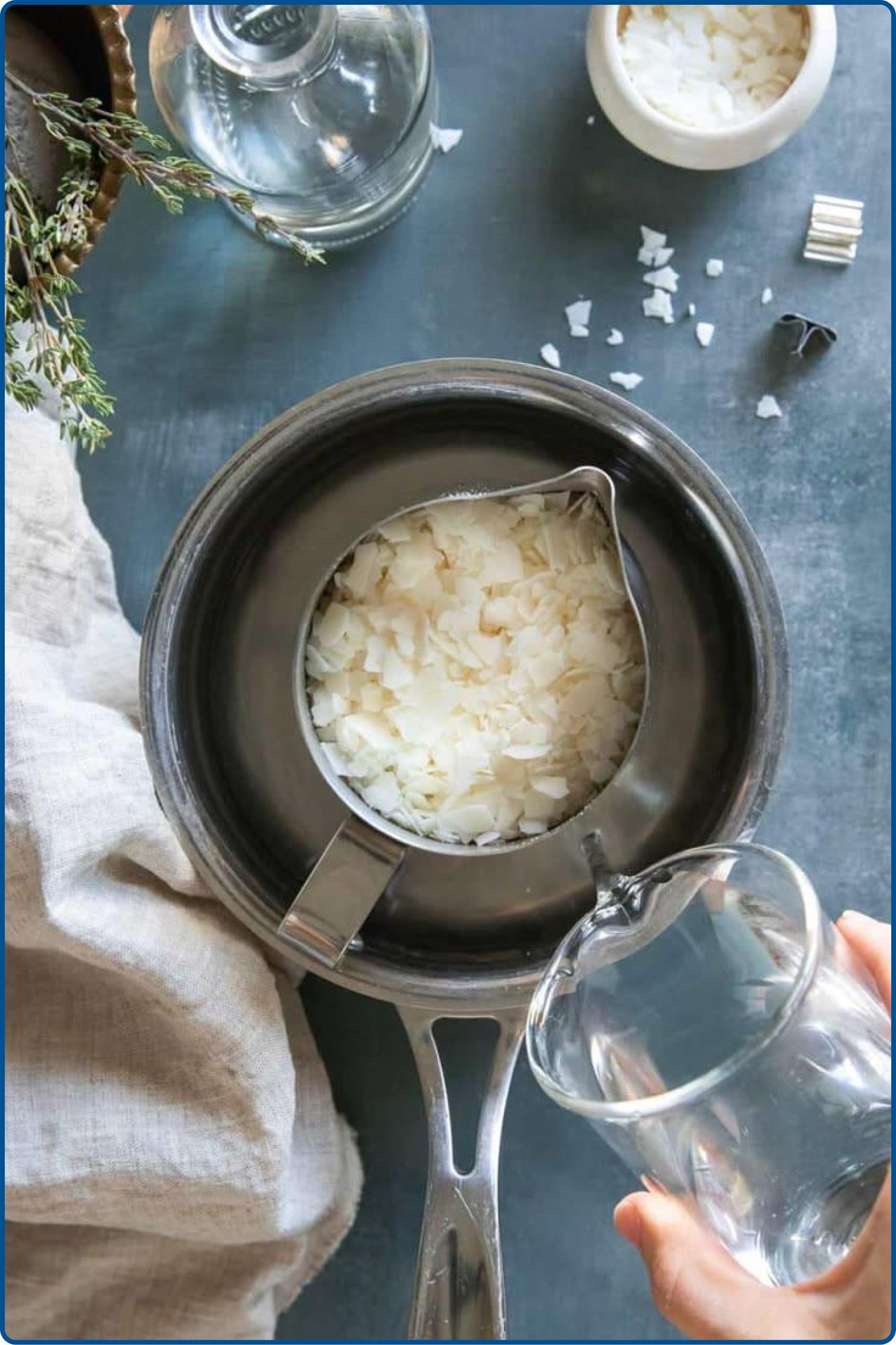 Wax melting slowly in double boiler for candles